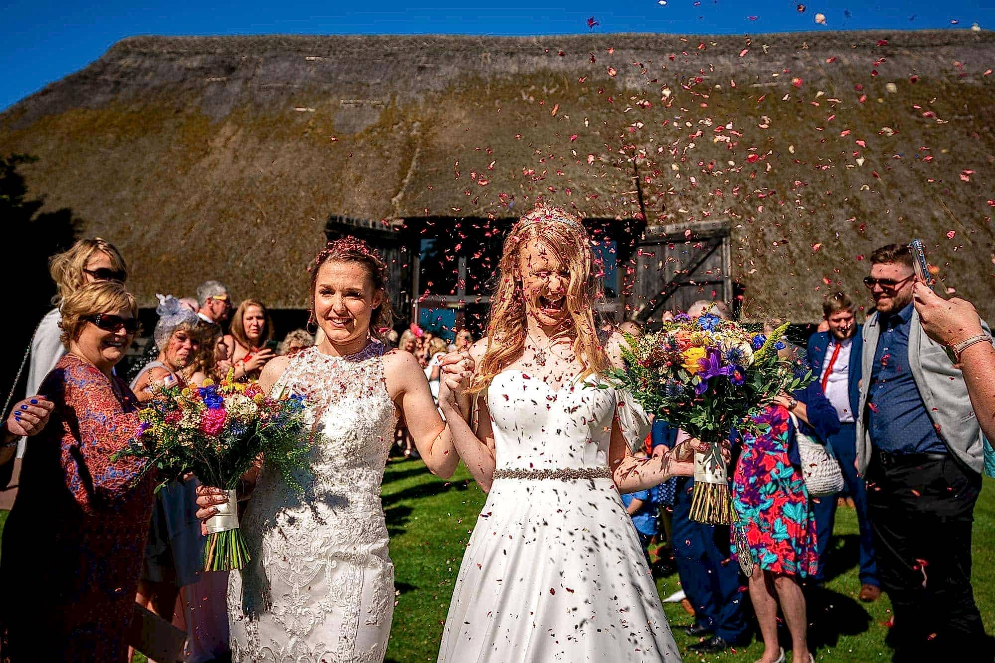 Norton Park Wedding Photographer - Two Brides Confetti Throw at Norton Park Hotel wedding