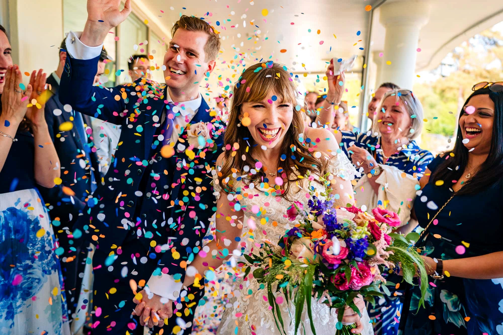Confetti throw at Southdowns Manor wedding